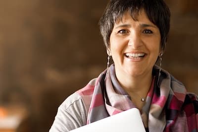 smiling woman wearing scarf