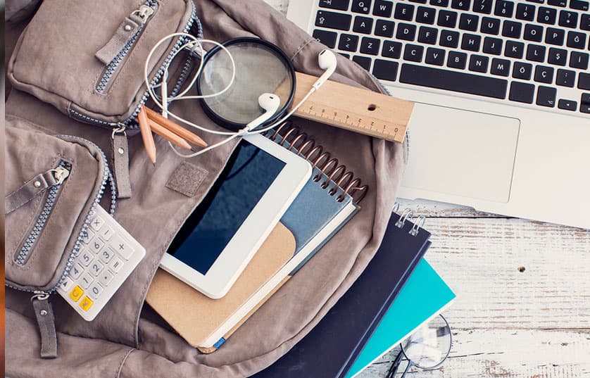 backpack with notebooks and iPad