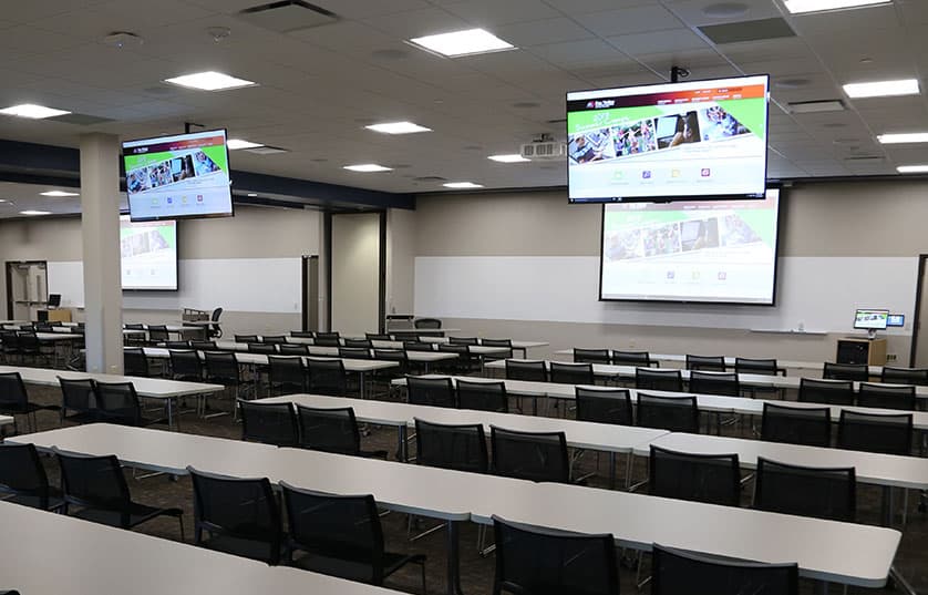 classroom at fox valley technical college with screens hanging from ceiling