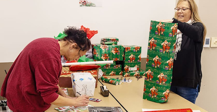 fox valley tech employees wrapping gifts