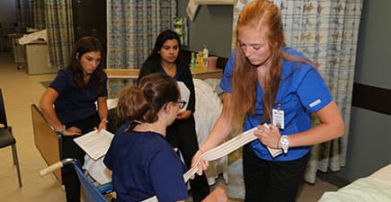 student learning physical therapy