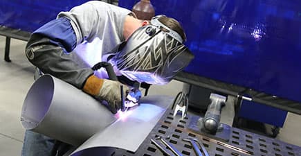 welding student in a lab