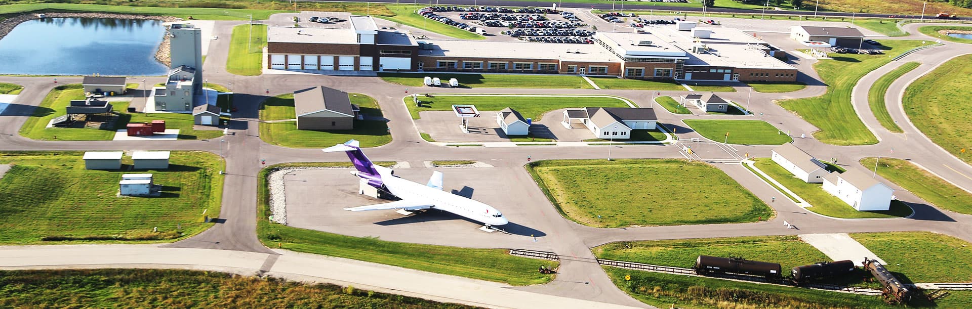 aerial view of Fox Valley Technical College Public Safety Training Center grounds with multiple buildings and airplane