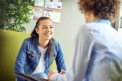 student talking with counselor or advisor