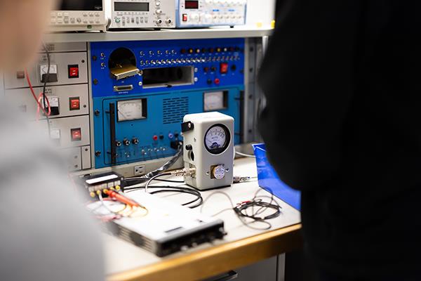 man working on aircraft electronics