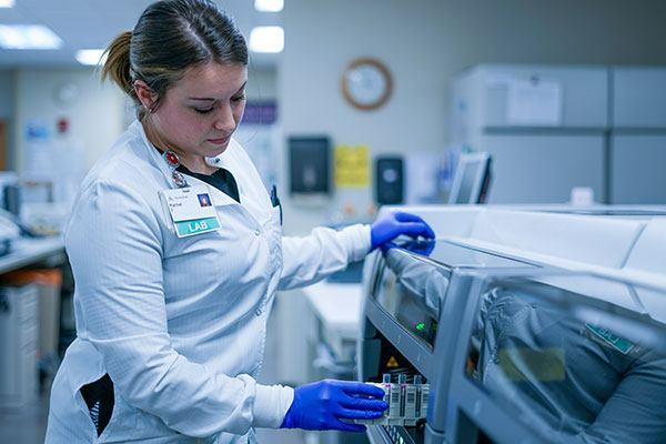 medical lab technician evaluating samples