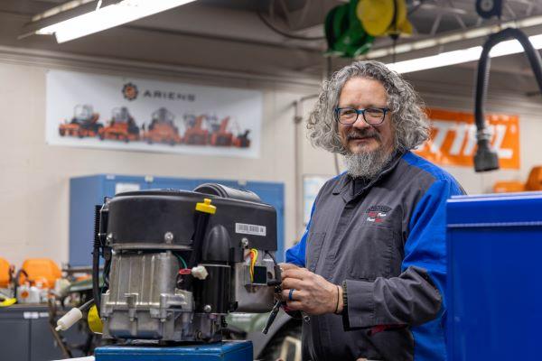 business owner working in a power sport shop