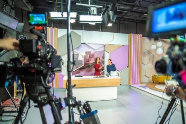 newscast set with cameras