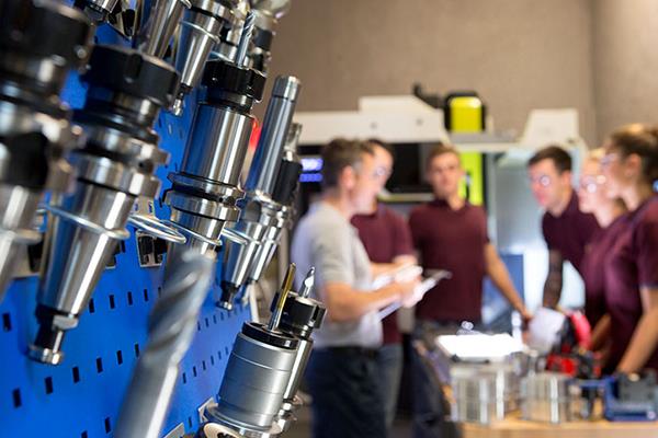 apprenticeship students learning in a high-tech lab