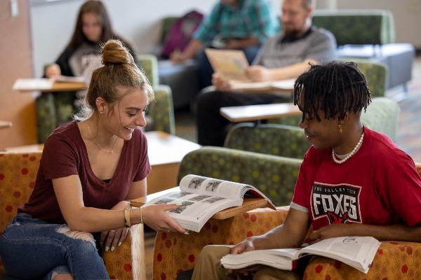 two students studying in the student success center