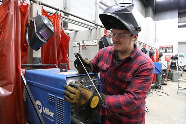 welding student getting set up for a project