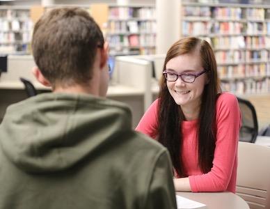 Students talking in the library at Fox Valley Technical College