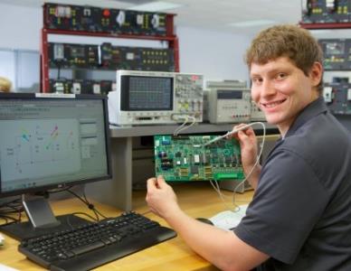 student working in an electronics lab
