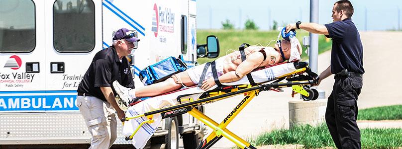 two students in an paramedic demonstration
