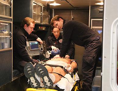 students in a paramedic and emergency medical services lab