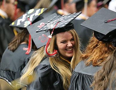 graduating students in cap and gown