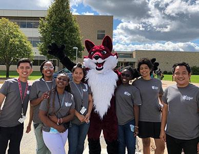 group of international students with Sly