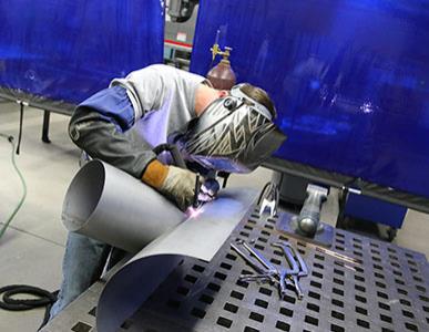 welder in welding helmet