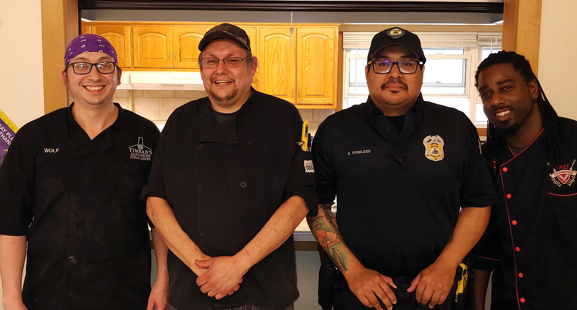 FVTC alumni Wolf Thorstenson, Kelly Laes, Officer Ralph Powless, and Ace Champion FVTC alumni Wolf Thorstenson, Kelly Laes, Officer Ralph Powless, and Ace Champion
